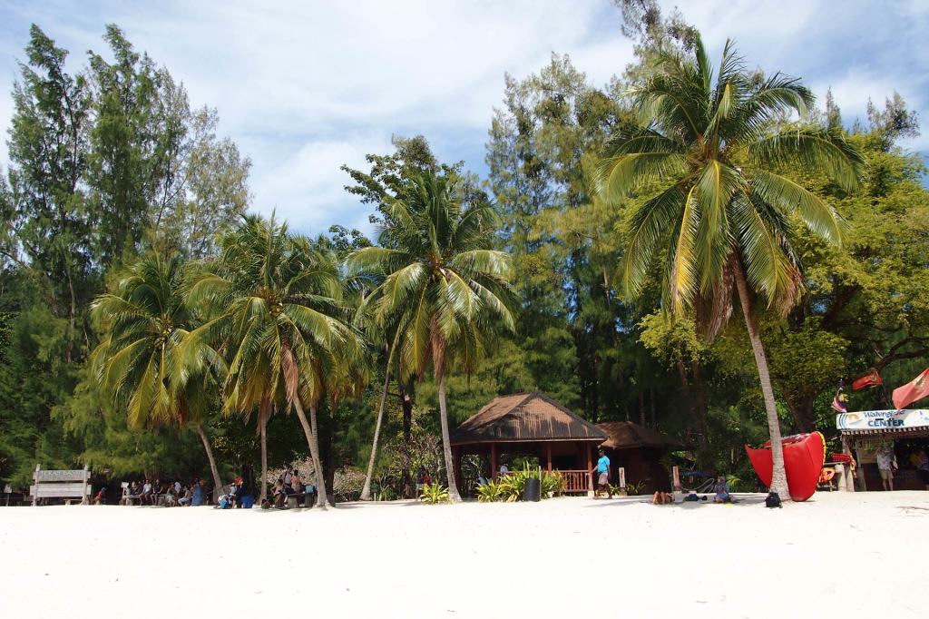 Small shops and huts at the beach of Pulau Beras Basah