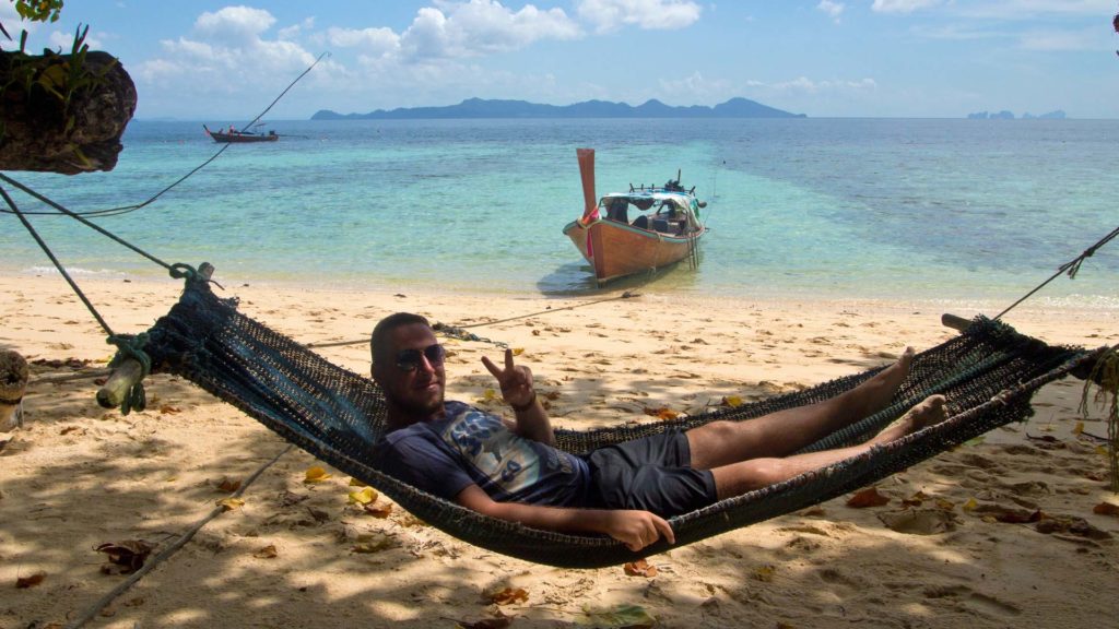 Tobi in a hammock on the Sunset Beach of Koh Kradan