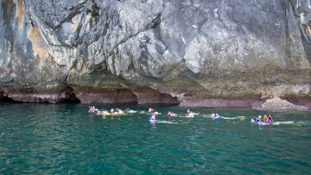 Tourists swimming into the Emerald Cave, Morakot Cave, Koh Mook