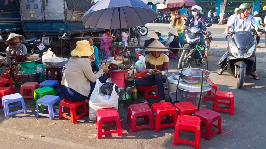 Street food stalls on a street in Ho Chi Minh City, Vietnam