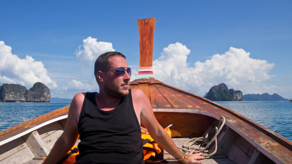 Tobi on a longtail boat on the way back to Koh Mook