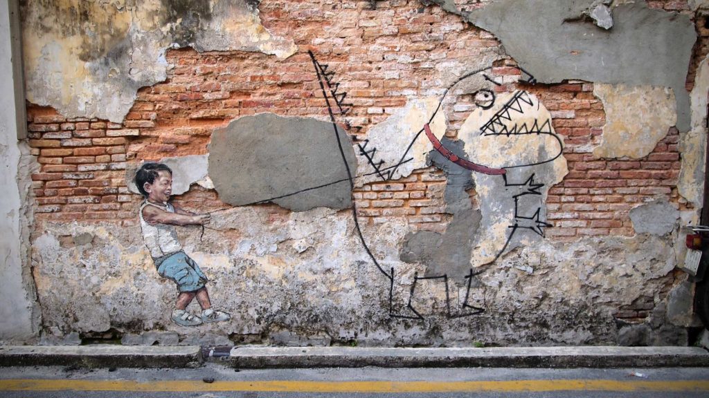 Street Art in George Town, Penang (Junge mit Dinosaurier)