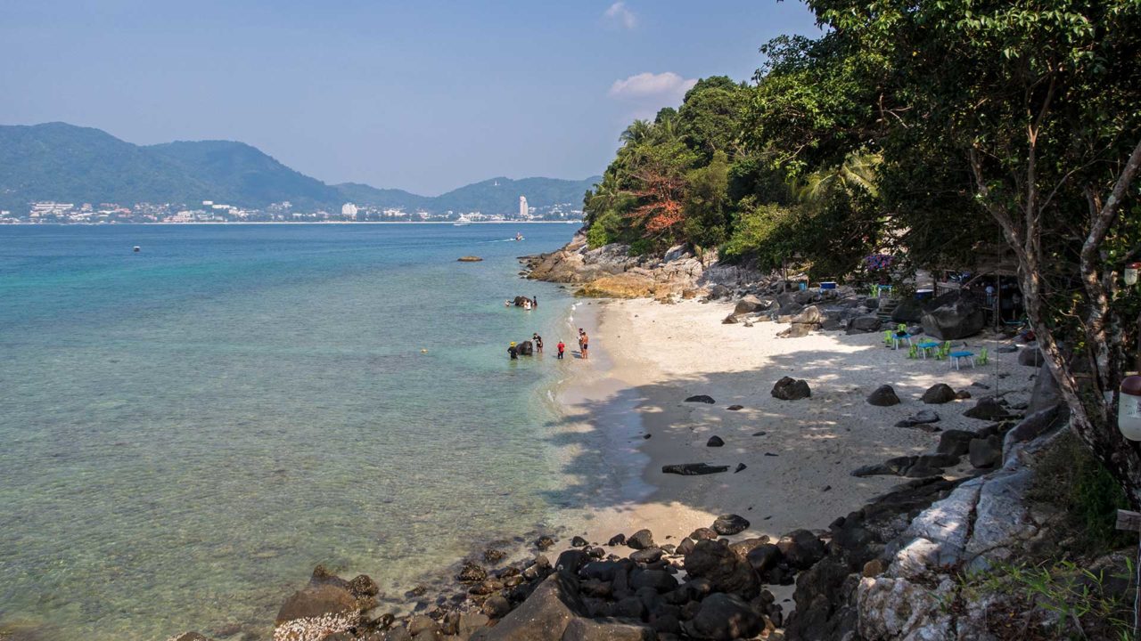 The hidden Lucky Beach near Patong on Phuket
