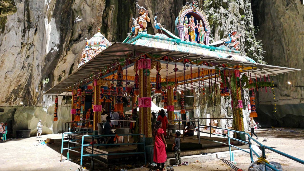 Small Hindu prayer hall inside the Batu Caves