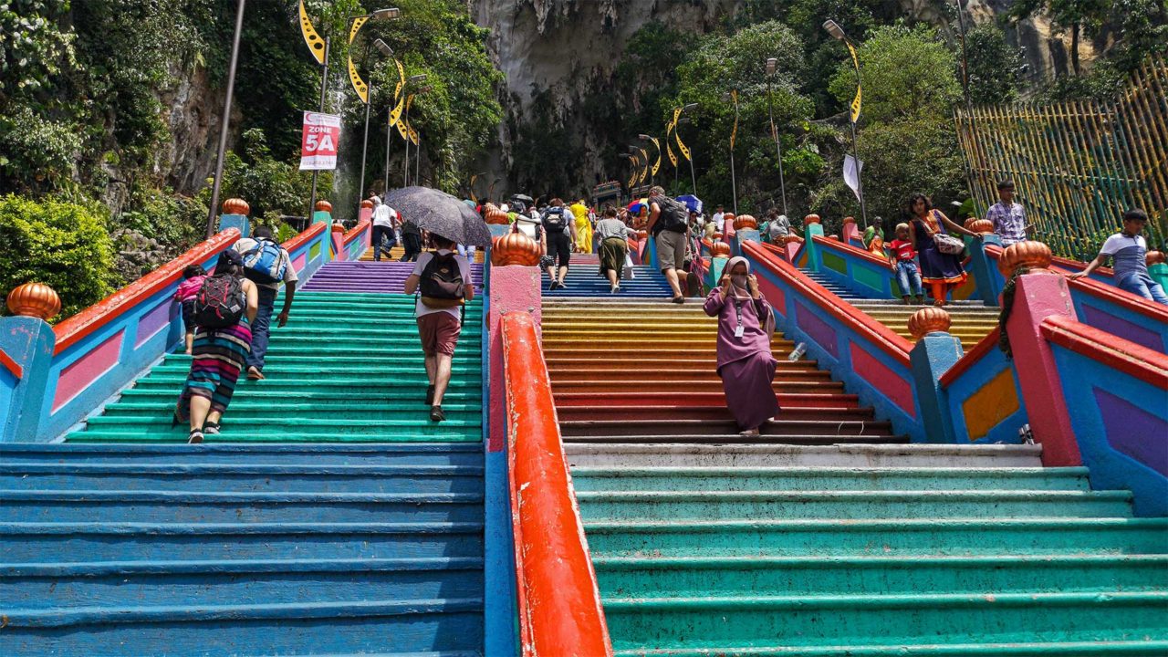 The colorful staircase to the Batu Caves outside of Kuala Lumpur