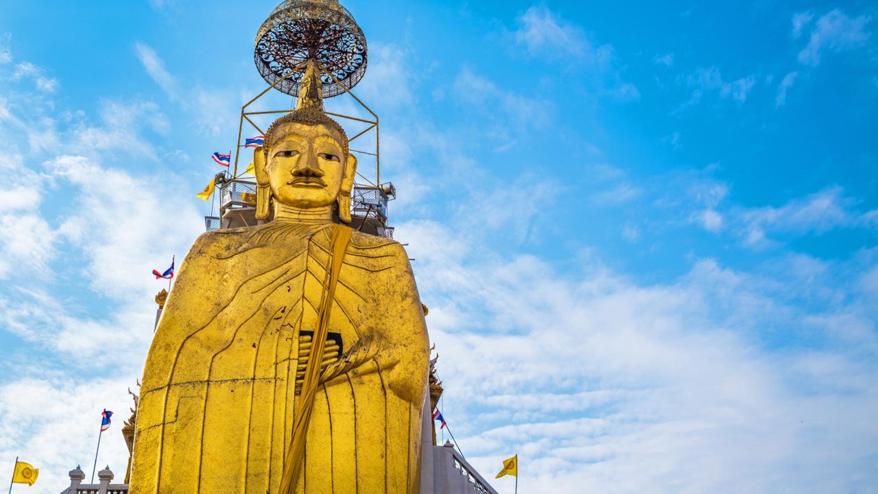 The Standing Buddha in the Wat Intharawihan in Bangkok
