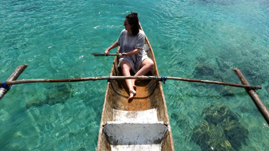 Lisa canoeing in front of Cubadak's paradise beach