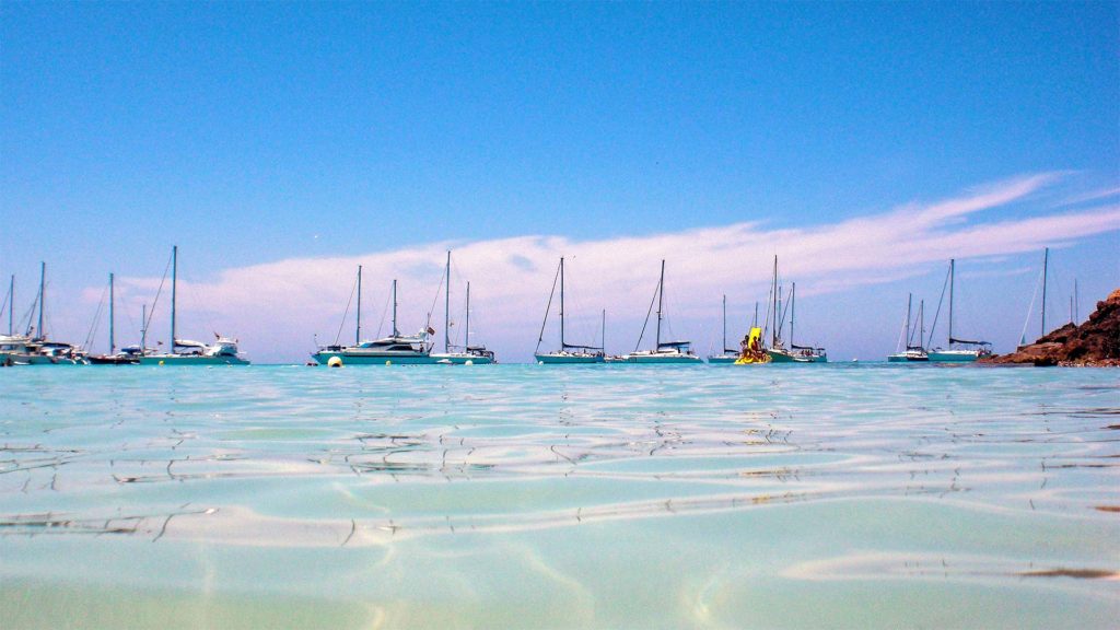 Boats on the beach at Cala Saona on Formentera