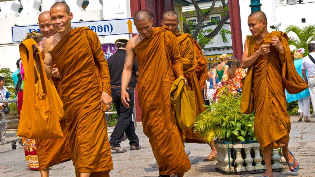 Monks at the Wat Phra Kaeo Royal Palace of Bangkok