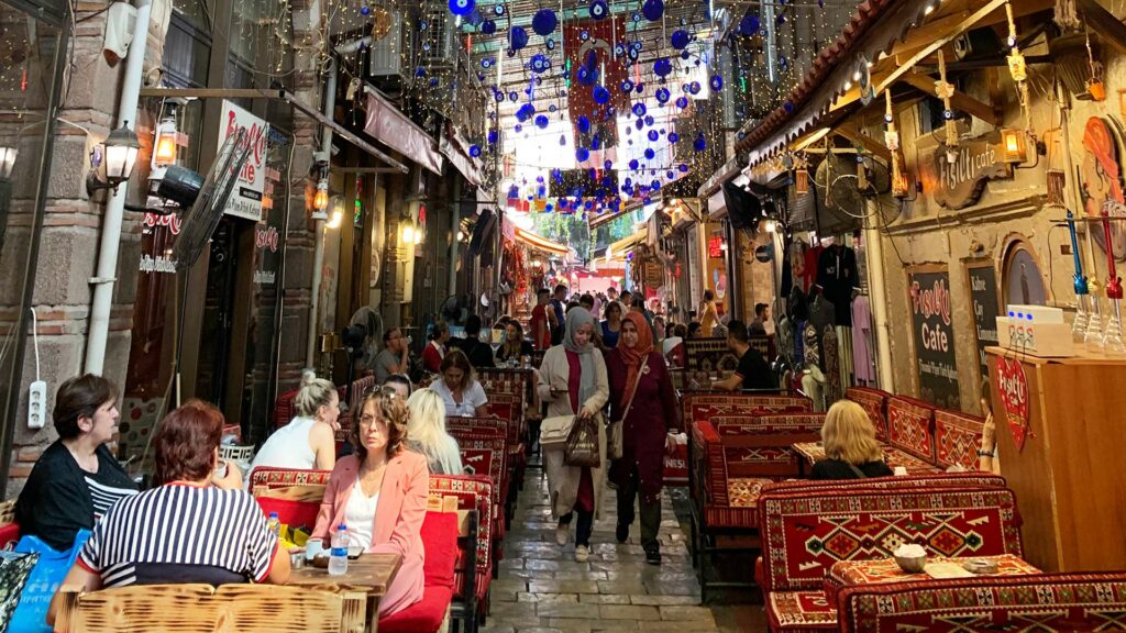 Narrow alleys and cafes in Kemeralti bazaar in Izmir, Turkey